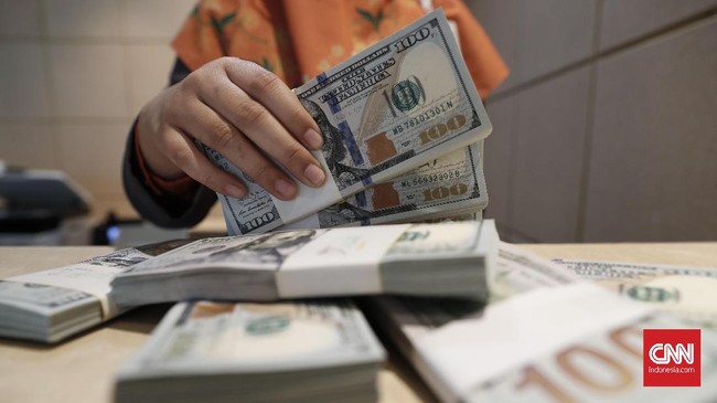 ilustrasi rupiah dan dolar.