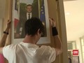VIDEO: Protes Iklim, Warga Prancis Copot Foto Macron