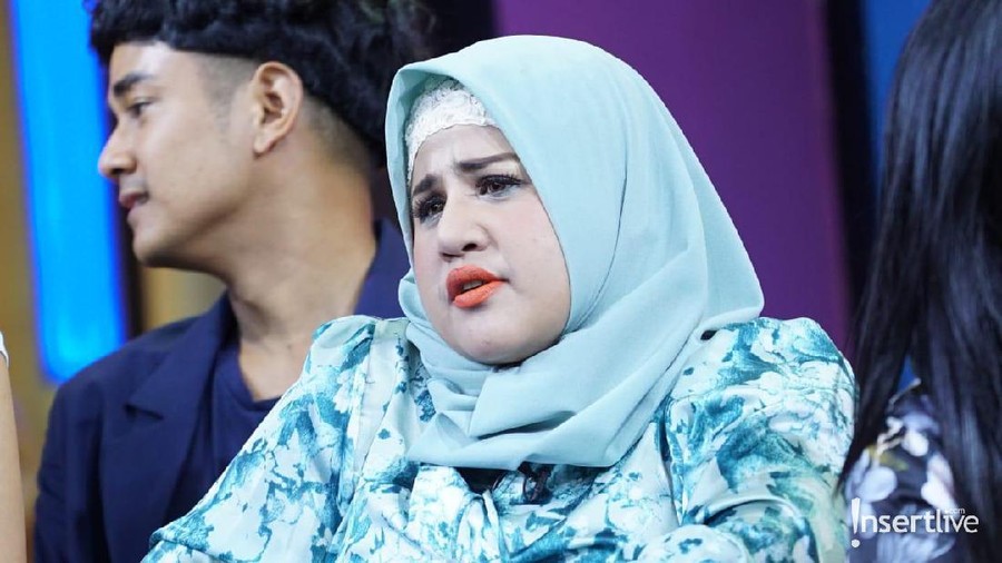 Tetangga Dhawiyah, putri dari Elvy Sukaesih, menuturkan kejadian penangkapan Muhammad B. 