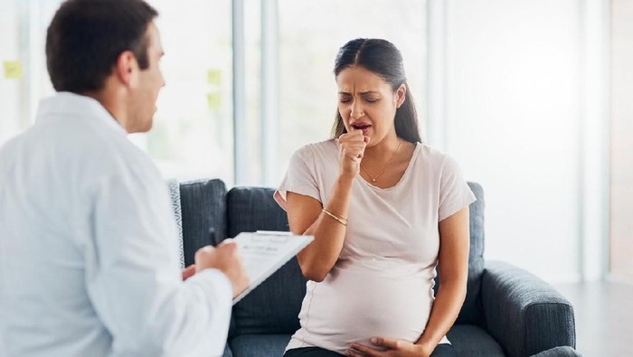 Shot of a pregnant woman having a consultation with her doctor