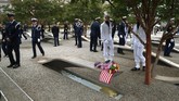 FOTO: Kenangan Pahit AS dalam Tragedi 9/11 Tragedi 11 September menjadi kenangan pahit bagi seluruh warga AS. Ribuan nyawa melayang akibat serangan kelompok Al Qaidah.