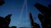 FOTO: Kenangan Pahit AS dalam Tragedi 9/11 Tragedi 11 September menjadi kenangan pahit bagi seluruh warga AS. Ribuan nyawa melayang akibat serangan kelompok Al Qaidah.