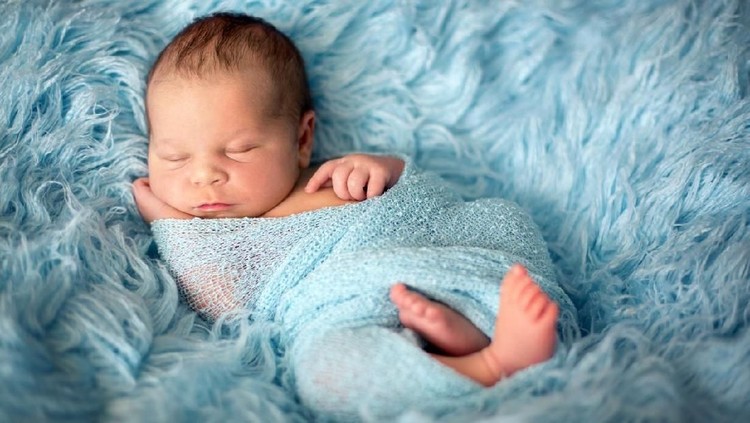 Portrait of sleeping newborn baby boy