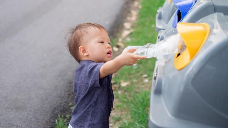 936793154 Cute little Asian 18 months / 1 year old toddler baby boy child throwing plastic bottle in recycling trash bin at public park, Eco friendly kid Recycling, Save the world & environment concept