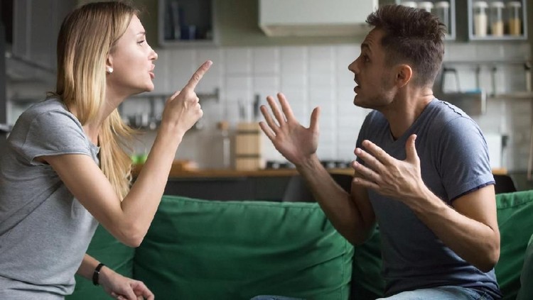 Angry millennial couple arguing shouting blaming each other of problem, frustrated husband and annoyed wife quarreling about bad marriage relationships, unhappy young family fighting at home concept
