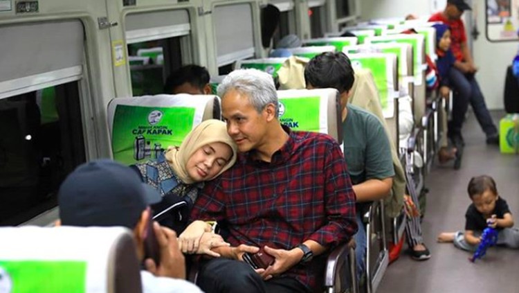 ganjar pranowo dan istrinya, Siti Atiqoh Apriyanti.