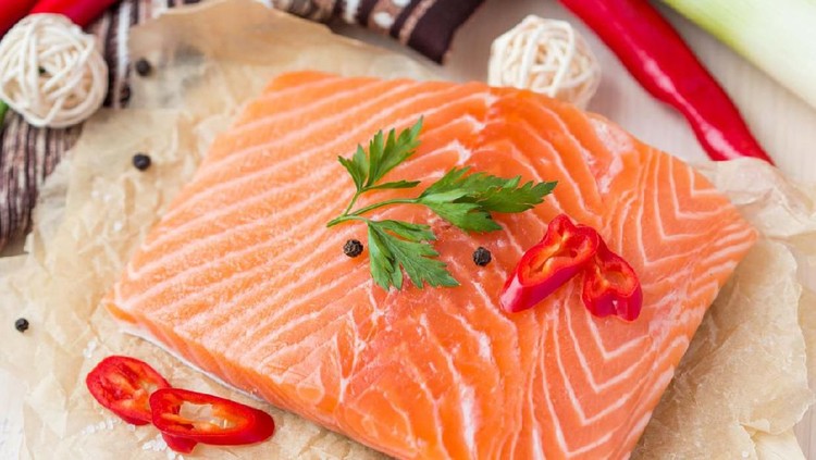 Raw fillets of red fish, salmon, cooking healthy diet dishes for dinner