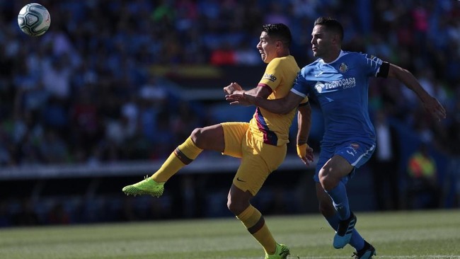 Meski tanpa Lionel Messi, Barcelona berhasil membungkam Getafe 2-0 pada lanjutan Liga Spanyol di Stadion Coliseum Alfonso Perez, Sabtu (28/9).