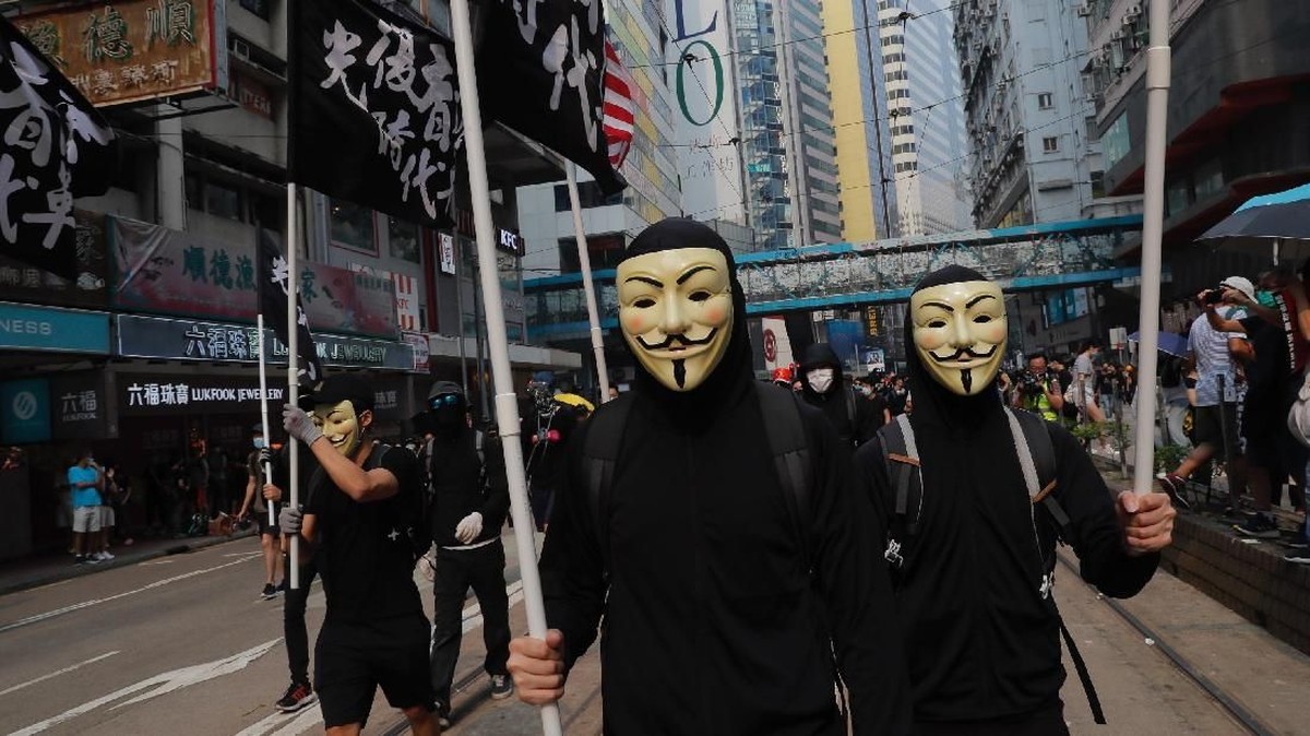 FOTO: Topeng-Topeng dalam Demonstrasi di Hong Kong