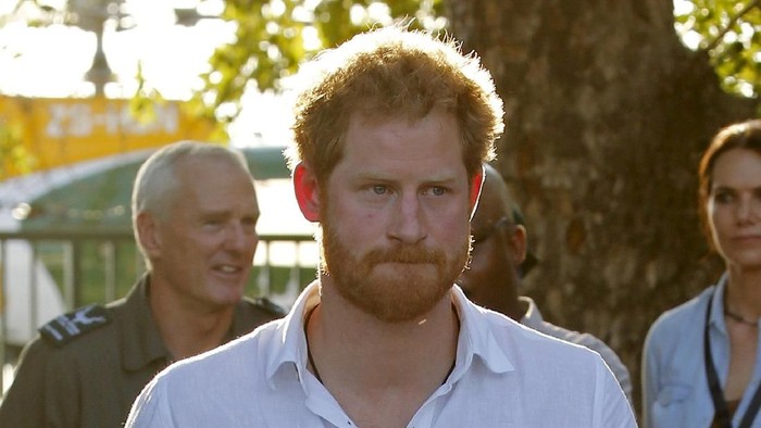 FILE PHOTO: Britain's Prince Harry leaves after meeting a Belgian Malinois named 