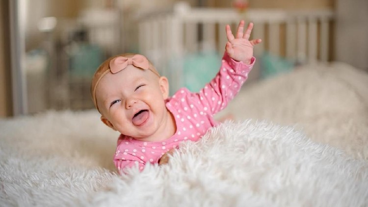 Happy baby girl. Happy little princess.