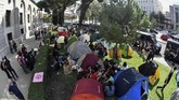 FOTO : Protes Perubahan Iklim Dari Penjuru Dunia Sejumlah aktivis kelompok 'Pemberontak Kepunahan' (Extinction Rebellion) menggelar aksi serentak menolak perubahan iklim di seluruh dunia.