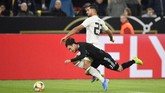FOTO: Duel Jerman vs Argentina Berakhir Tanpa Pemenang Timnas Jerman harus puas bermain imbang 2-2 melawan timnas Argentina dalam laga uji coba di Stadion Signal Iduna Park, Dortmund, Kamis (10/10) dini hari WIB.