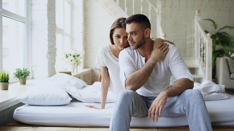 A shot of a simple, but beautiful moment between two people talking to each other at home.