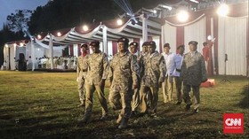 Tutup Rakornas, Prabowo Didampingi Sandi Pakai Seragam Loreng