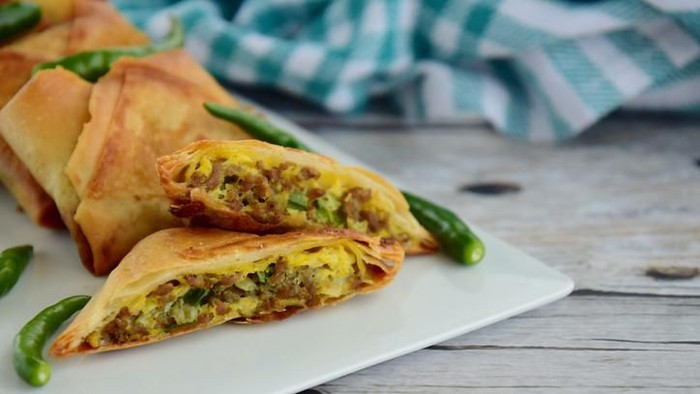 making spring rolls, commercial kitchen