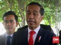 Tiba di Gedung MPR, Jokowi-Iriana Lempar Senyum ke Pewarta
