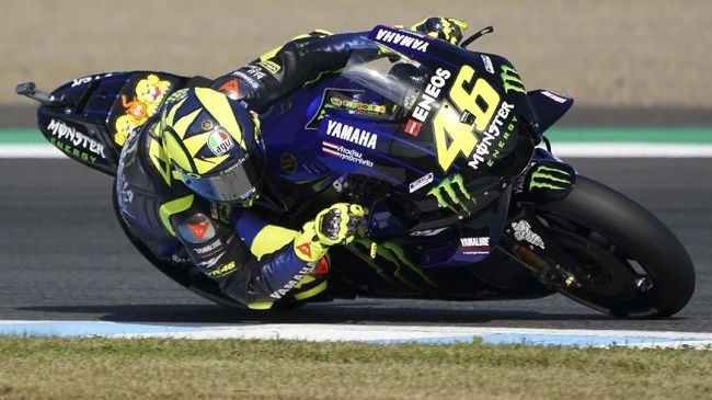 MotoGP Jepang 2019 Italy's MotoGP rider Valentino Rossi rides during a warm-up for the MotoGP Japanese Motorcycle Grand Prix at the Twin Ring Motegi circuit in Motegi, north of Tokyo, Sunday, Oct. 20, 2019. (AP Photo/Christopher Jue)
