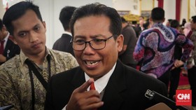 Grasi Annas Maamun, Istana Lempar Bola ke Menkumham