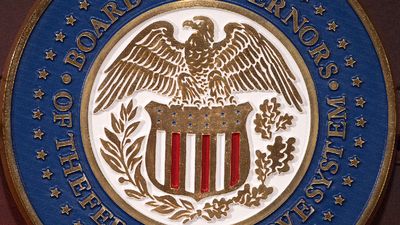 The seal of the Board of Governors of the Federal Reserve System is seen on the lectern during a press conference September 17, 2014 at the US Federal Reserve in Washington, DC. AFP PHOTO/Paul J. Rich