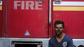 FOTO : Kebakaran Hutan Ancam Wilayah Elite California Kebakaran hutan dan lahan di California terus meluas. Api terus bergerak akibat angin kencang ke pemukiman elite dekat Los Angeles.