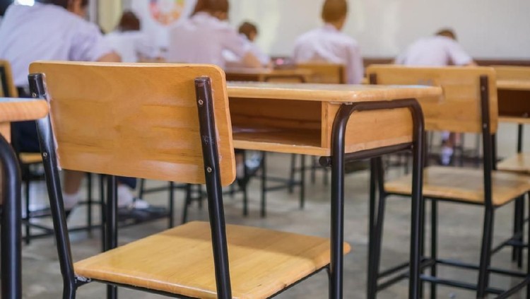 Lecture room or School empty classroom with Student taking exams, writing examination for studying lessons in high school thailand, interior of secondary education, whiteboard. educational concept