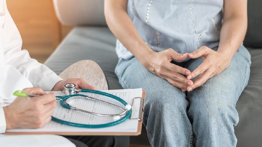 Doctor or psychiatrist consulting and diagnostic examining stressful woman patient on obstetric - gynecological female illness, or mental health in medical clinic or hospital healthcare service center