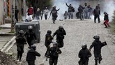 FOTO: Wajah Krisis Politik Bolivia Demonstrasi yang kerap berujung ricuh selama tiga pekan terakhir terjadi di jalan-jalan utama di Bolivia.