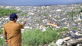 FOTO: Bangkai Babi Terpapar Kolera Berserakan di Sumut Ratusan bangkai babi terpapar virus Hog Cholera berserakan di sungai dan mencemari lingkungan sejumlah wilayah di Sumatera Utara.