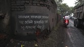 FOTO: Nasib Tambang Batu Bara India Berusia Seabad Sebuah tambang batu bara di Jharia, India terus memuntahkan api dan awan asap beracun sejak seabad terakhir.