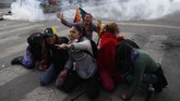 FOTO : Bolivia Masih Membara Sampai saat ini sudah 23 orang meninggal dunia akibat demonstrasi yang berujung ricuh di Bolivia.