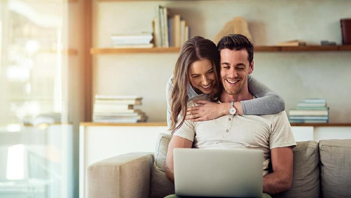 Head shot woman anxious worried woman sitting on couch at home. Frustrated confused female feels unhappy, problems in personal life, quarrel break up with boyfriend and unexpected pregnancy concept