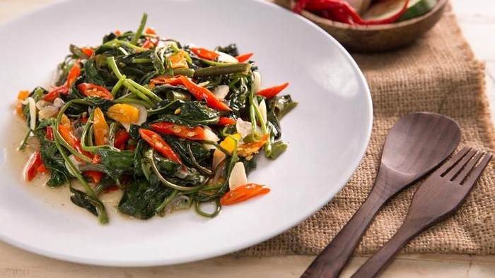Delicious Cah Kangkung, Delicious stir fried water spinach or kale. Indonesian food
