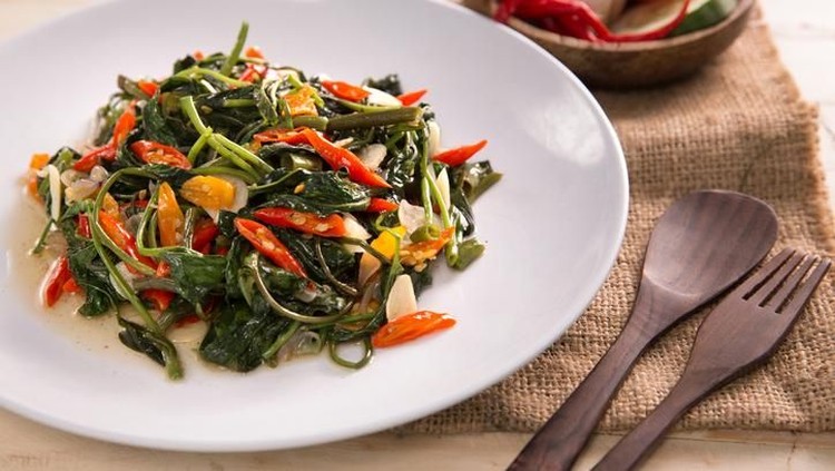 Delicious Cah Kangkung, Delicious stir fried water spinach or kale. Indonesian food