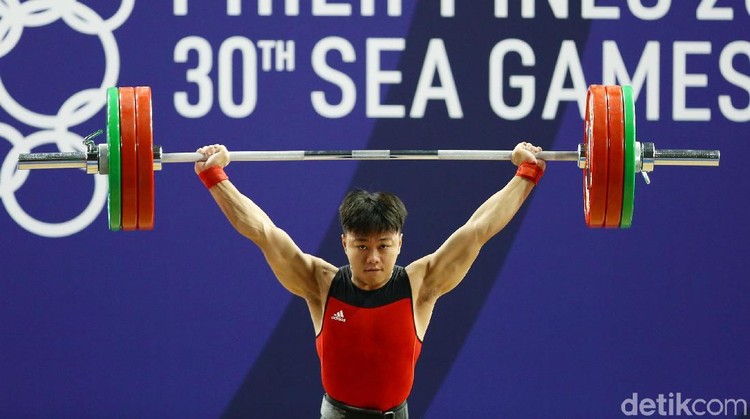 Mantap Jiwa! Rahmat Sumbang Emas ke-15 untuk Indonesia Atlet angkat besi, Rahmat Erwin Abdullah, menambah koleksi medali emas Indonesia di SEA Games 2019 Filipina. Dia menjadi yang terbaik di kelas 73 kg putra.