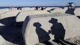 NYALANG: Belenggu Bayang-bayang Semu Foto-foto unik pilihan CNNIndonesia.com pada pekan ini berisi di antaranya soal mobil pasir di Argentina hingga buaya raksasa di Amerika Serikat.