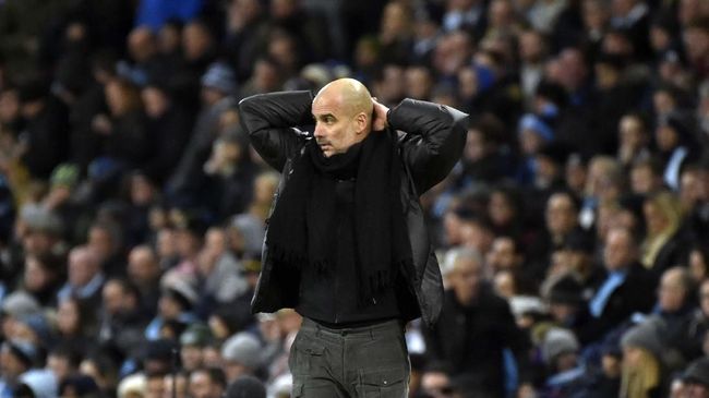 Manchester City VS Manchester United Manchester City's head coach Pep Guardiola reacts during the English Premier League soccer match between Manchester City and Manchester United at Etihad stadium in Manchester, England, Saturday, Dec. 7, 2019. (AP Photo/Rui Vieira)