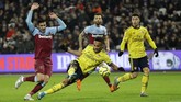 FOTO: Arsenal Bangkit di Markas West Ham Arsenal tertinggal satu gol sebelum akhrinya menang 3-1 atas West Ham. Simak foto-foto pilihan dari laga lanjutan Liga Inggris, Selasa (10/12) dini hari WIB.