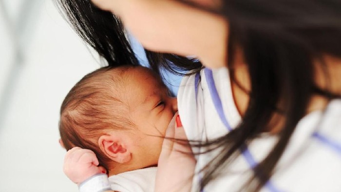 Mother Breastfeeding her newborn