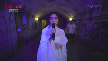 img-title Isyana Sarasvati Tampil Misterius Bersama Zombie di HUT Transmedia