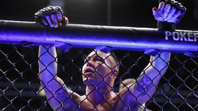 FOTO: Kamaru Usman Hajar Covington Hingga TKO di UFC 245