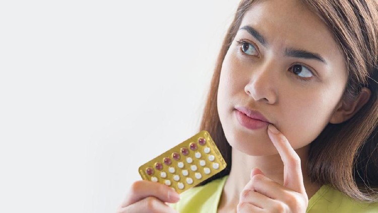 Woman hand holding a contraceptive panel prevent pregnancy