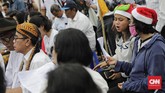 FOTO: Natal ke-8 di Luar Istana, Protes Jemaat pada Negara Jemaat GKI Yasmin Bogor dan HKBP Filadelfia Bekasi mengikuti perayaan Natal di seberang Istana Merdeka, Jakarta, Rabu (25/12).