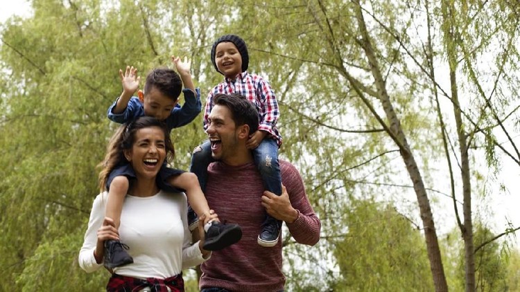 Happy family with children on winter ski vacationHappy family enjoying winter vacations in mountains and making selfie
