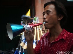 Hukum Meniup Terompet di Malam Tahun Baru dalam Islam, Ini Penjelasannya