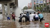 FOTO : Banjir Awal Tahun di Jakarta Awal tahun 2020 menjadi hal yang muram bagi warga DKI Jakarta dan sekitarnya akibat meluasnya banjir sebab curah hujan yang tinggi.