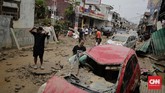 FOTO: Kondisi Pondok Gede Permai Bekasi Usai Diterjang Banjir Banjir menerjang Perumahan Pondok Gede Permai, Jatiasih, Bekasi, Jawa Barat, di awal tahun baru 2020. Kendaraan dan bangunan hancur.