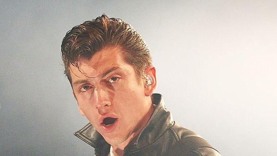 136287437 LORNE, AUSTRALIA - DECEMBER 31: Alex Turner of the Arctic Monkeys performs on stage on day three of the Falls Music Festival on December 31, 2011 in Lorne, Australia. (Photo by Mark Metcalfe/Getty Images)