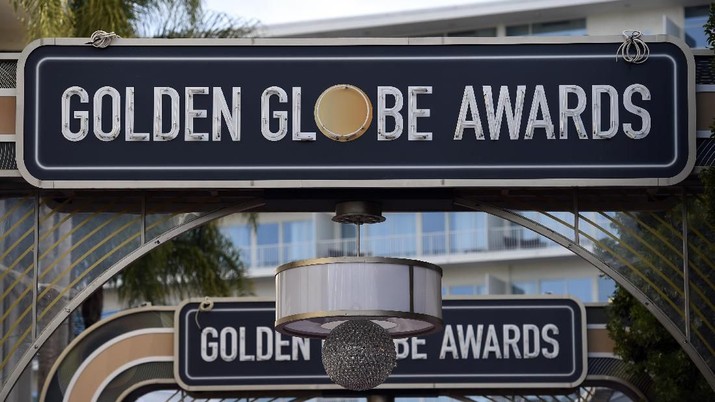 Signs for the 77th Annual Golden Globe Awards hang over the red carpet during Preview Day for the Globes at the Beverly Hilton, Friday, Jan. 3, 2020, in Beverly Hills, Calif. The annual awards show recognizing excellence in film and television will be held on Sunday. (AP Photo/Chris Pizzello)