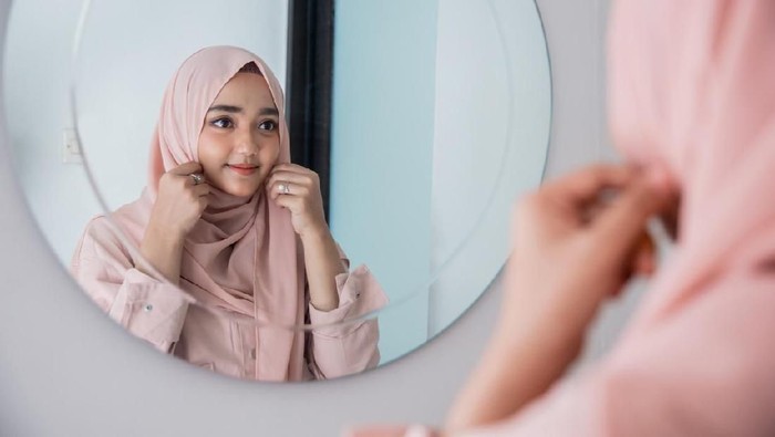 Ilustrasi perempuan berhijab